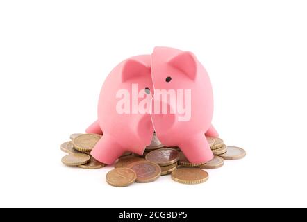 Broken piggy bank with coins on white background with clipping path Banque D'Images