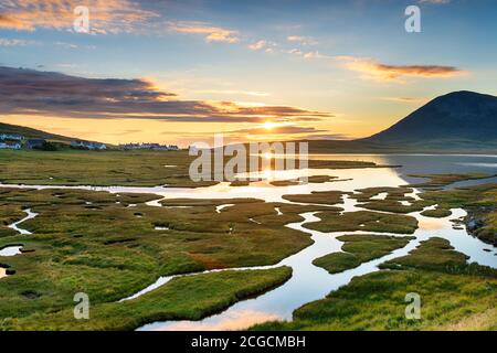 Coucher de soleil sur les salines à Northton sur l'île De Harris dans les îles occidentales de l'Écosse Banque D'Images