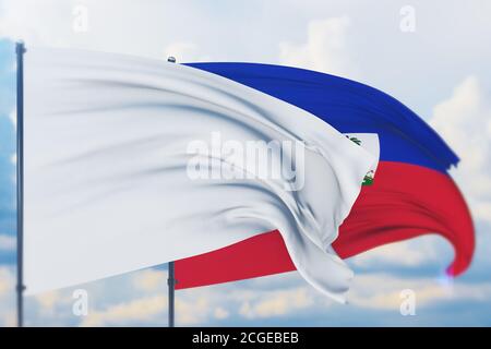 Drapeau blanc sur le mât agitant dans le vent et drapeau d'Haïti. Vue en gros plan, illustration 3D. Banque D'Images