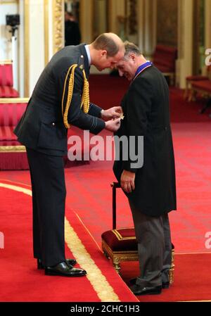 Sir David Hempleman-Adams de Box est fait chevalier commandant de l'ordre royal victorien par le duc de Cambridge à Buckingham Palace. Banque D'Images