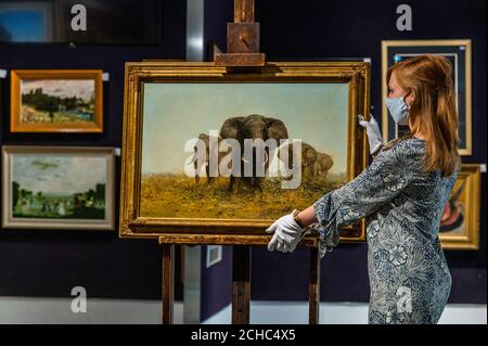 Londres, Royaume-Uni. 14 septembre 2020. David Shepherd, Afro Elepophants in teh Savanna, est £15-25,000 - Aperçu de la vente d'art britannique et irlandais moderne de Bonhams dans leur salon Knightsbridge. Crédit : Guy Bell/Alay Live News Banque D'Images