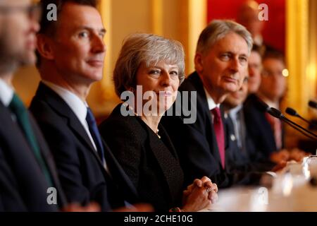 (De gauche à droite) le secrétaire aux Affaires étrangères Jeremy Hunt, la première ministre Theresa May et le chancelier de l'Échiquier Philip Hammond lors des consultations intergouvernementales Royaume-Uni-Pologne à Lancaster House, Londres. Banque D'Images