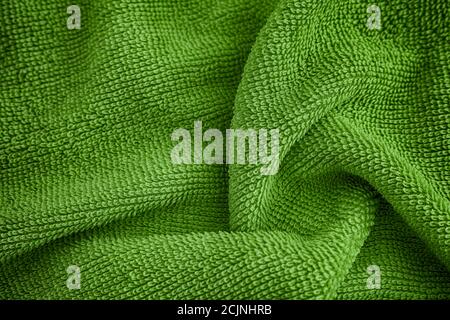 Arrière-plan texture serviette vert foncé. Gros plan. Banque D'Images