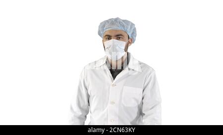 La chirurgie dans un masque mature balade Vue de face sur fond blanc. Banque D'Images