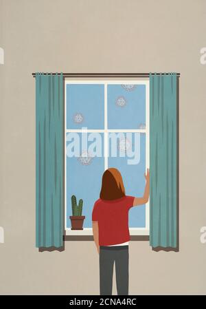 Femme à la fenêtre regardant des particules flottantes de coronavirus Banque D'Images
