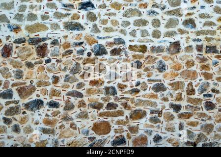 Gros plan de la texture de fond des petits cailloux rugueux Banque D'Images