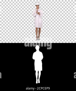 Femme ingénieur écrivant la liste de contrôle de marche, Alpha Channel Banque D'Images