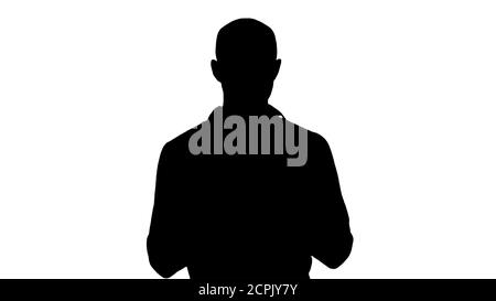 Silhouette Homme décontracté utilisant le téléphone portable Smart écrire un message. Banque D'Images