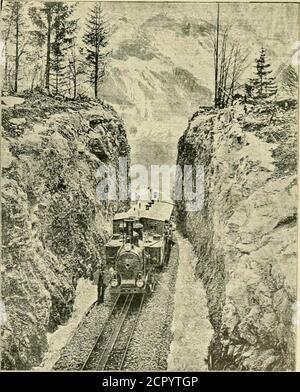 . La revue de chemin de fer de rue . et celle des trains de marchandises 130 tonnes. Sur les sections de montagne, les trains de voyageurs sont généralement divisés et consistés de quatre voitures de passagers avec le courrier et les fourgonnettes de bagages, pesant 50 tonnes sans le moteur. Sur les sections de la vallée, la vitesse développée est de vingt-sept milles à l'heure sur une pente de 1,5 %, sur les sections de montagne adhérentes de 12,5milles à l'heure avec une pente de 2 % et sur les sections de mountain à crémaillère de 8 km avec une pente de 10.5 %. La lineis a travaillé toute l'année sauf de décembre à mars, quand la section de montagne est fermée parce qu'il y a du trafic nopassenger. La ligne carri Banque D'Images