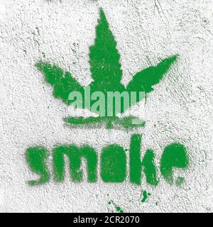Symbole de feuille de marijuana sur le mur grundy avec message « moke » Banque D'Images