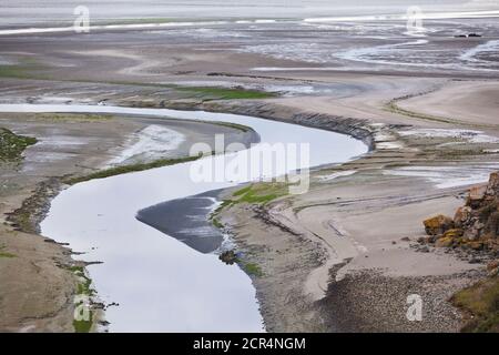 La rivière Gouessant qui coule dans la baie de Saint Brieuc à la plage de Saint-Maurice. Une partie de la réserve naturelle naturelle naturelle de la Baie de St. Banque D'Images