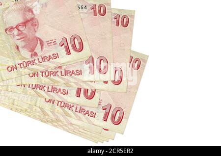 10 les billets de liras turcs se trouvent en petit groupe ou paquet isolé sur blanc. Maquette avec espace de copie. Concept de bureau de change et d'affaires Banque D'Images