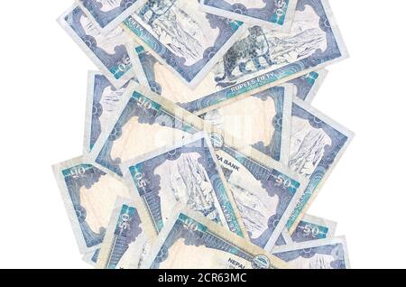 50 rupees népalaises bills volant isolé sur blanc. De nombreux billets tombant avec un espace de copie blanc à gauche et à droite Banque D'Images