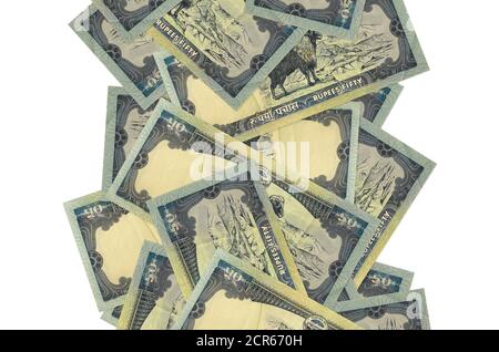 50 rupees népalaises bills volant isolé sur blanc. De nombreux billets tombant avec un espace de copie blanc à gauche et à droite Banque D'Images