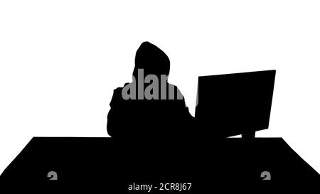 Un hacker expérimenté de Silhouette répond à un appel. Banque D'Images