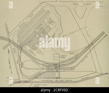 . Electric Railway Review . HE Philadel-phia Rapid Transit Company, par la Philadelphia & Westches-ter traction Company et par la Philadelphia & WesternRailroad. À un point situé à 600 pieds à l'ouest de la limite ouest de Philadelphie, à la soixante-troisième rue, l'élévation, par une courbe anaisée, atteint la voie privée i-iuliit ol Way de la société Westchester brochet le long de laquelle s'étend la ligne actuelle de la Philadelphia & Westchester traction Company, se terminant à la soixante-troisième rue. La partie principale du Philadelphia Rapid Transit COM-panys section du bâtiment, qui est le coin sud-est Banque D'Images