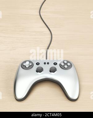 Manette de jeu filaire sur table en bois Banque D'Images