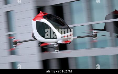 Drone passager électrique volant en face de bâtiments. C'est un modèle 3D et n'existe pas dans la vie réelle. 3D illustration Banque D'Images