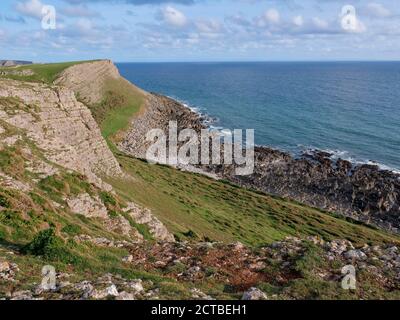 L'ancien presbytère une maison d'islamolation dans le paysage et plage à Rhossili Beach sur la Gower Peninsula Wales Royaume-Uni Banque D'Images