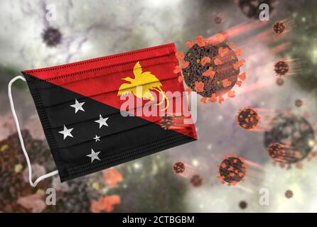 Masque facial avec drapeau de Papouasie-Nouvelle-Guinée, défendant le coronavirus Banque D'Images