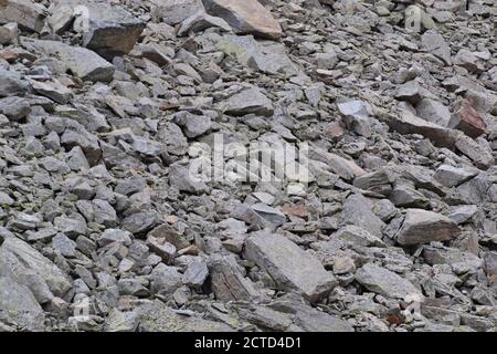 Fond uniforme composé de pierres de montagne. Banque D'Images