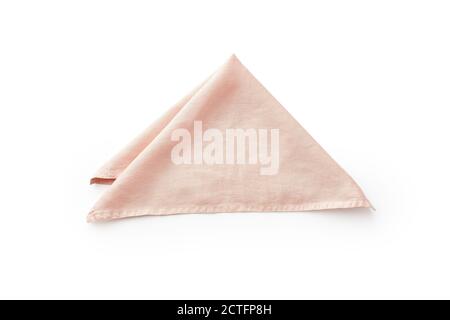 Linge de cuisine en lin de couleur pêche, posé sur un fond blanc. Tissu plié pour la maquette Banque D'Images