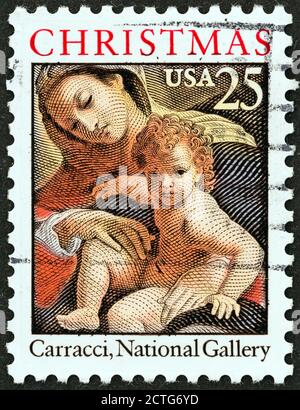 USA - VERS 1989: Un timbre imprimé aux Etats-Unis de l'édition de Noël montre Dream of St. Catherine of Alexandria (Ludovico Carracci), National Gallery. Banque D'Images