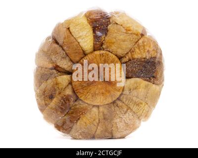 Paquet rond de figues séchées isolées sur blanc Banque D'Images