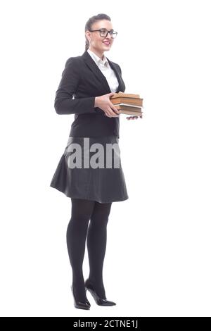 en pleine croissance. une femme d'affaires souriante avec une pile de livres Banque D'Images