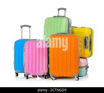 Valises multicolores isolées sur blanc Banque D'Images