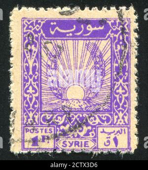 SYRIE - VERS 1946: Timbre imprimé par la Syrie, montre le Soleil et les oreilles de blé, vers 1946 Banque D'Images