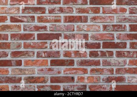 Mur rouge en brique ancienne. Banque D'Images