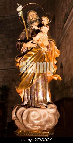 San José con el niño Jesús en la Iglesia del Salvador en Plasencia. Cáceres. Estrémadure. Espagne Banque D'Images