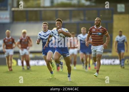 Regan Grace (5) de St Helens brise et marque un essayez de le faire 0-16 Banque D'Images