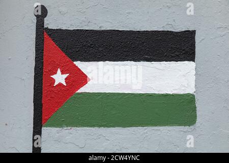 Dessin de style enfantin, du drapeau de la Jordanie, peint sur un mur. Banque D'Images