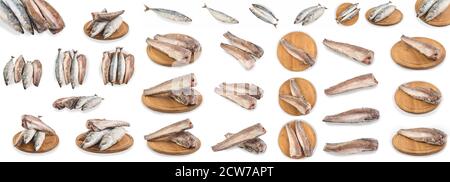 Définir le poisson congelé isolé sur fond blanc avec un masque. Assortiment de maquereaux frais et crus et de merlu pour le motif. Poisson congelé à sec. Banque D'Images
