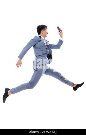 Prenez la course téléphonique sautez un homme d'affaires Banque D'Images