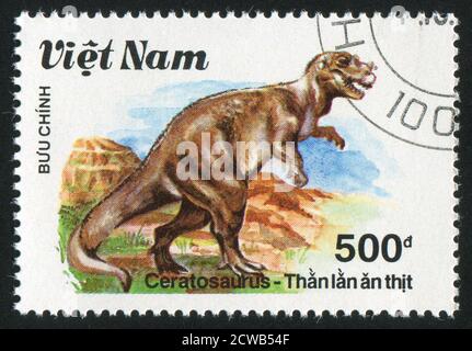 VIET NAM - VERS 1990: Timbre imprimé par le Viet Nam, montre Ceratosaurus, vers 1990 Banque D'Images