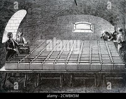 Gravure représentant la batterie géante construite au sous-sol de la Royal institution, Londres, par Humphry Davy. La batterie était composée de 200 piles de Wollaston. Banque D'Images