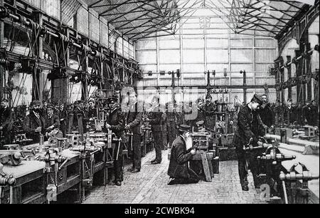 Gravure représentant le Royal Naval Engineering College, Devonport. Cadets dans l'un des ateliers de formation. Banque D'Images