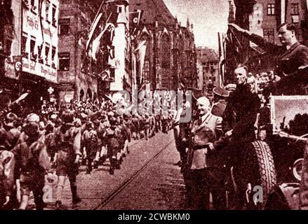 Photo en noir et blanc d'une démonstration de la jeune hitlérienne en parding devant Baldur von Schirach. Banque D'Images