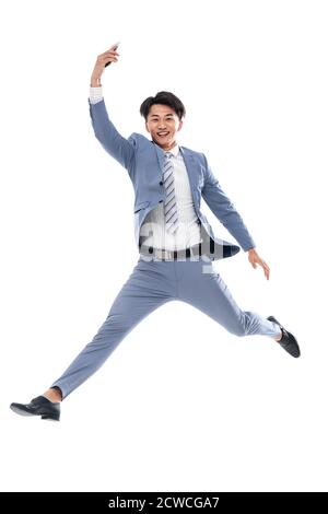 Prenez la course téléphonique sautez un homme d'affaires Banque D'Images