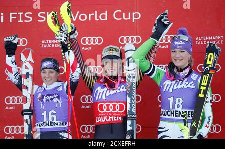 Michaela Kirchgasser of Austria, winner Marie-Michele Gagnon of Canada and Maria Hoefl-Riesch of Germany (LtoR) celebrate on the podium after the World Cup Women's super combined race in Altenmarkt-Zauchensee January 12, 2014. REUTERS/Leonhard Foeger (AUSTRIA - Tags: SPORT SKIING)