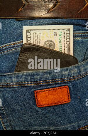 jeans et dollars Banque D'Images