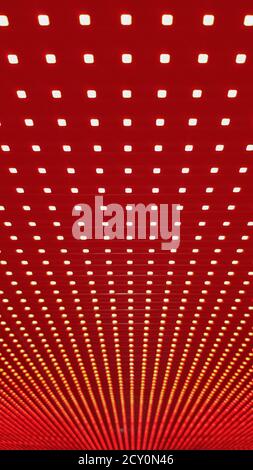 Texture du panneau d'écran LED RVB. Gros plan d'un écran LED de pixels avec bokeh pour fond d'écran. Arrière-plan abstrait rouge vif idéal pour tous les modèles Banque D'Images