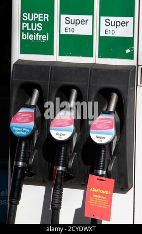 An information label is fixed to a Super E10 pump at a gas ...
