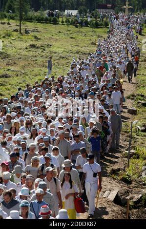 Members of the religious sect of Vissarion, who has proclaimed himself a  new Christ, take part in the 