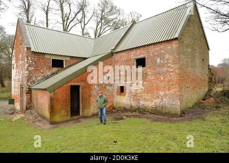 Une ferme vide dans le village d'Imber partie du terrain d'entraînement militaire à Salisbury Plain, Wiltshire, Angleterre, Royaume-Uni Banque D'Images