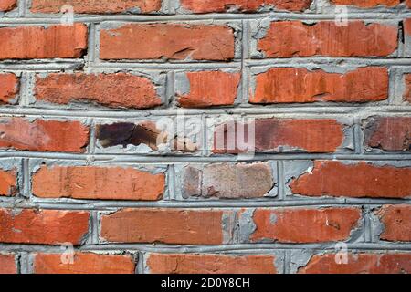 image d'une section d'un vieux mur de briques rouges pour un arrière-plan ou une texture Banque D'Images