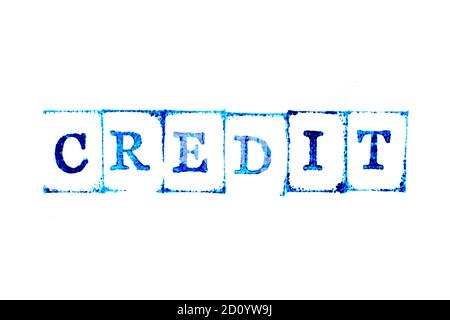 Encre bleue de tampon en caoutchouc dans le mot Credit on arrière-plan du livre blanc Banque D'Images